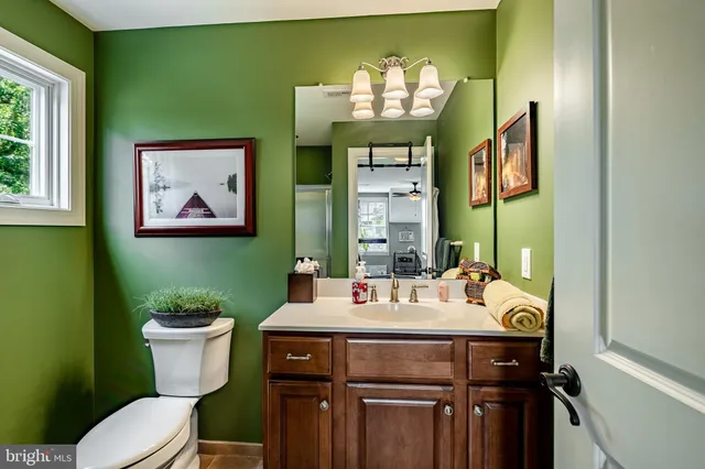 a living room with fireplace furniture and a flat screen tv