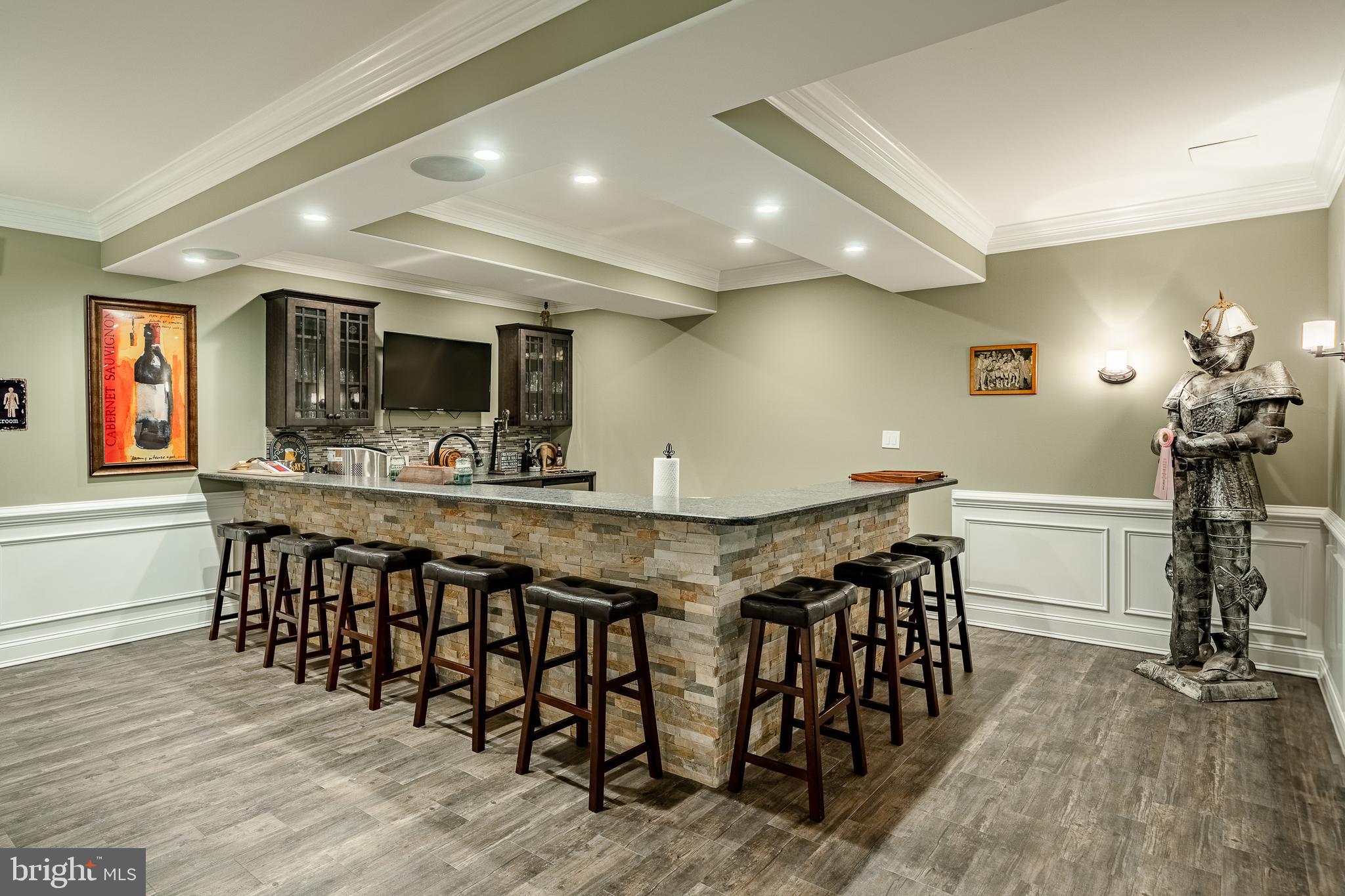 211 Dutton Mill Road West Chester, PA 19380 - Photo 43 of 71 a kitchen with stainless steel appliances a kitchen island hardwood floor and a sink