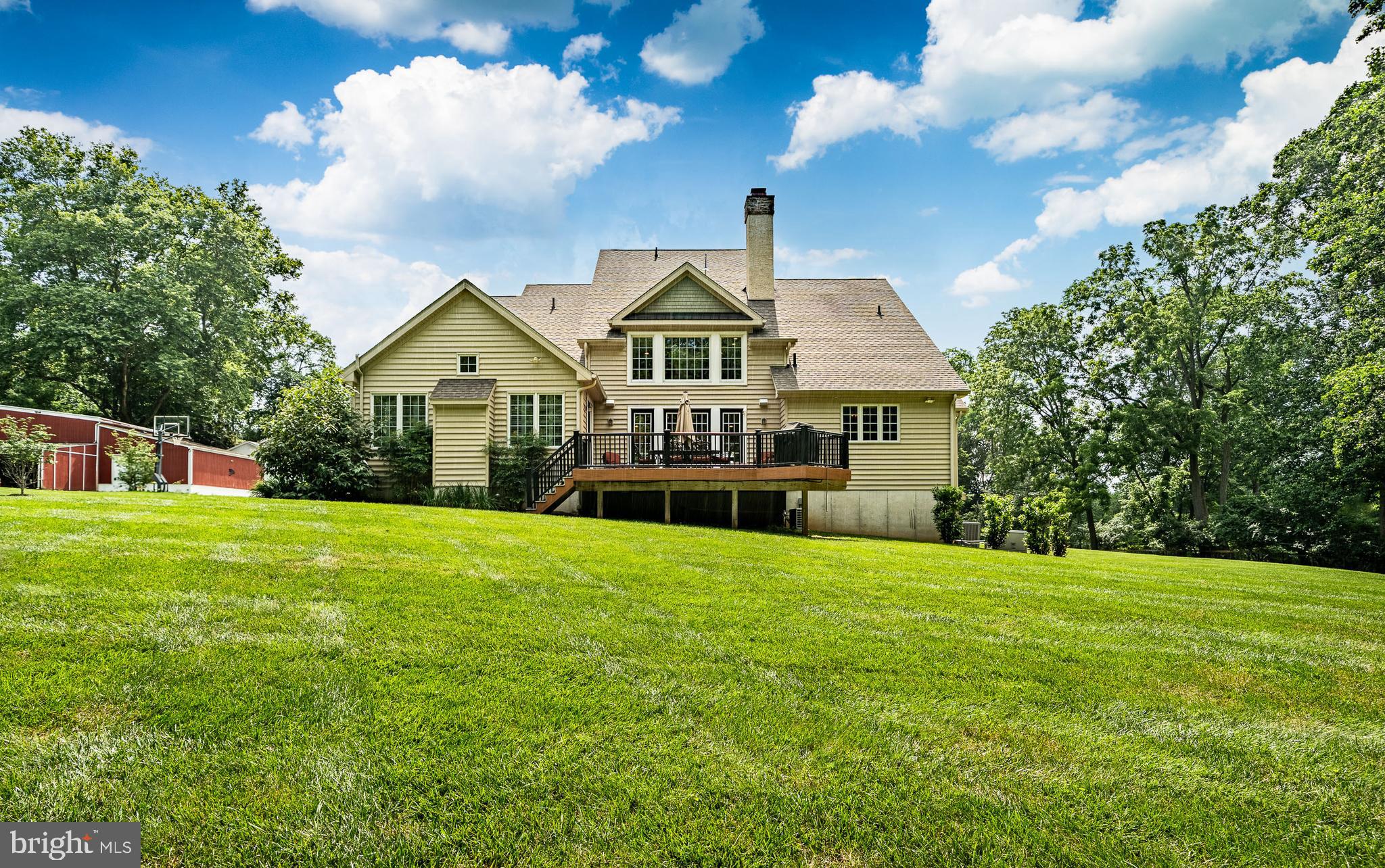 211 Dutton Mill Road West Chester, PA 19380 - Photo 46 of 71 a front view of a house with a garden