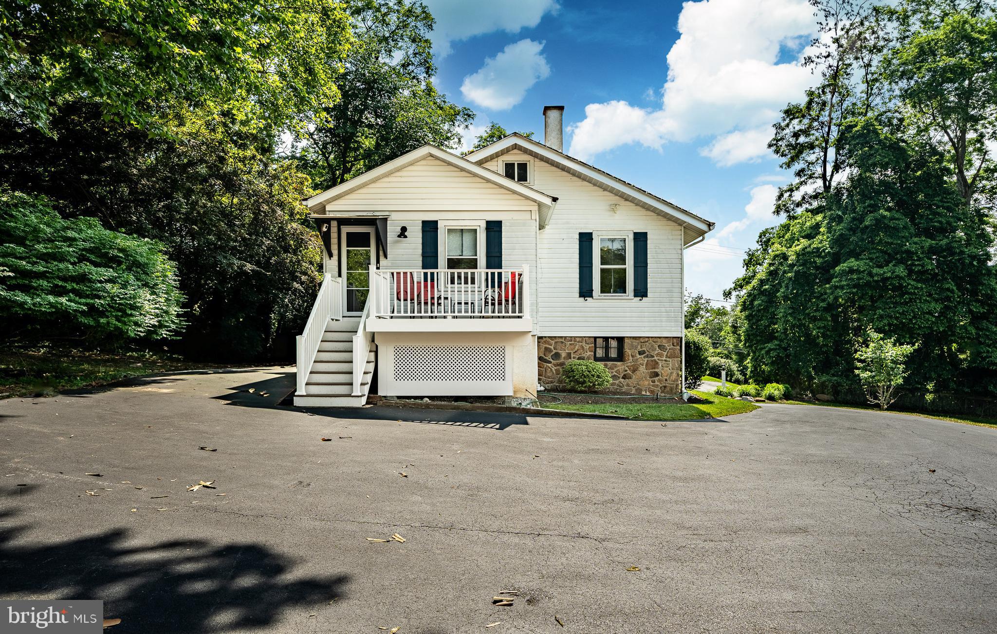 211 Dutton Mill Road West Chester, PA 19380 - Photo 52 of 71 a front view of a house with a yard