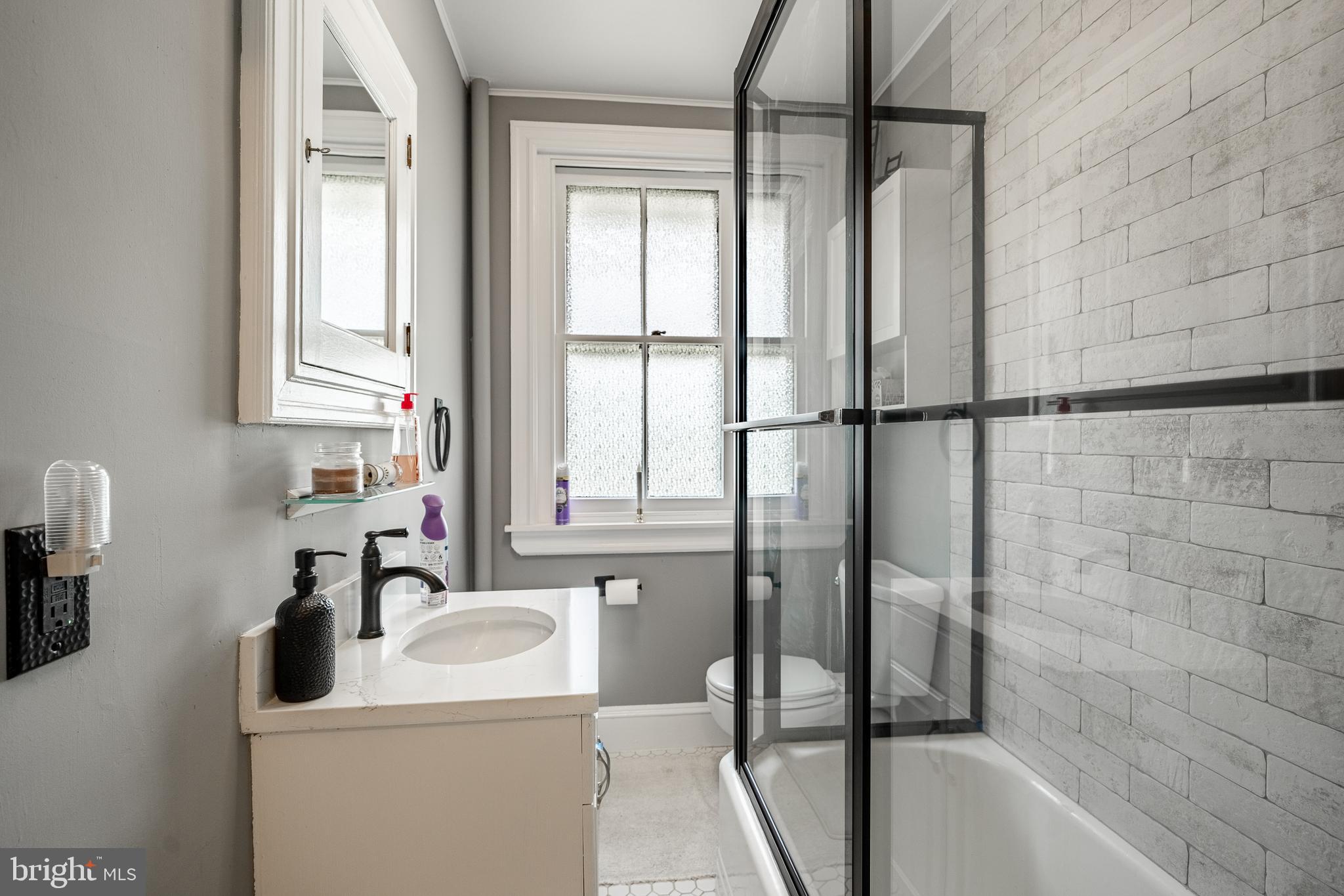 211 Dutton Mill Road West Chester, PA 19380 - Photo 60 of 71 a bathroom with a sink and a bathtub