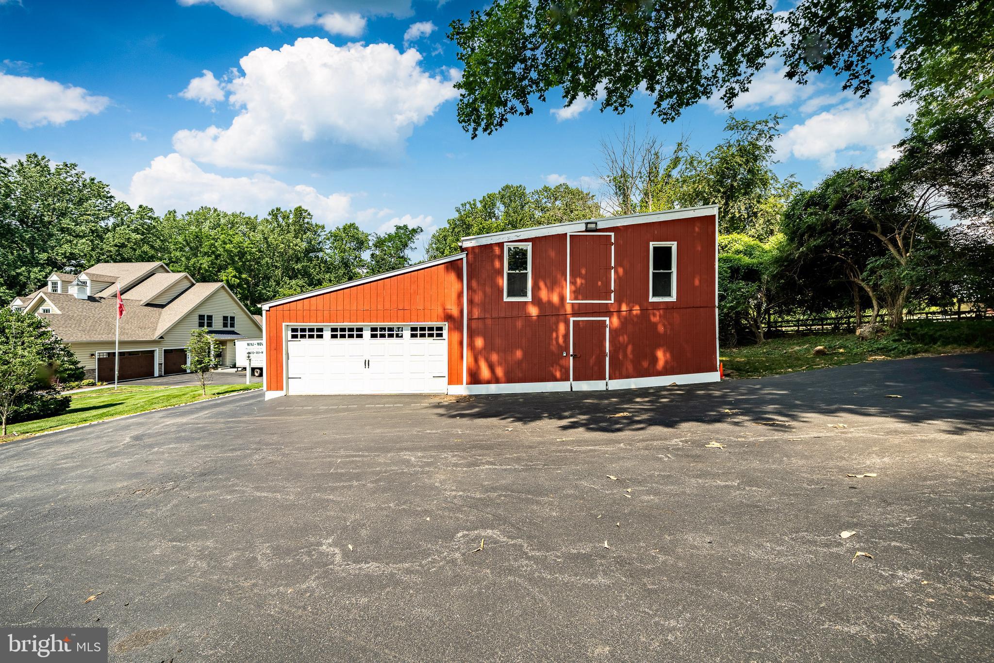 211 Dutton Mill Road West Chester, PA 19380 - Photo 65 of 71 a view of a house with a yard