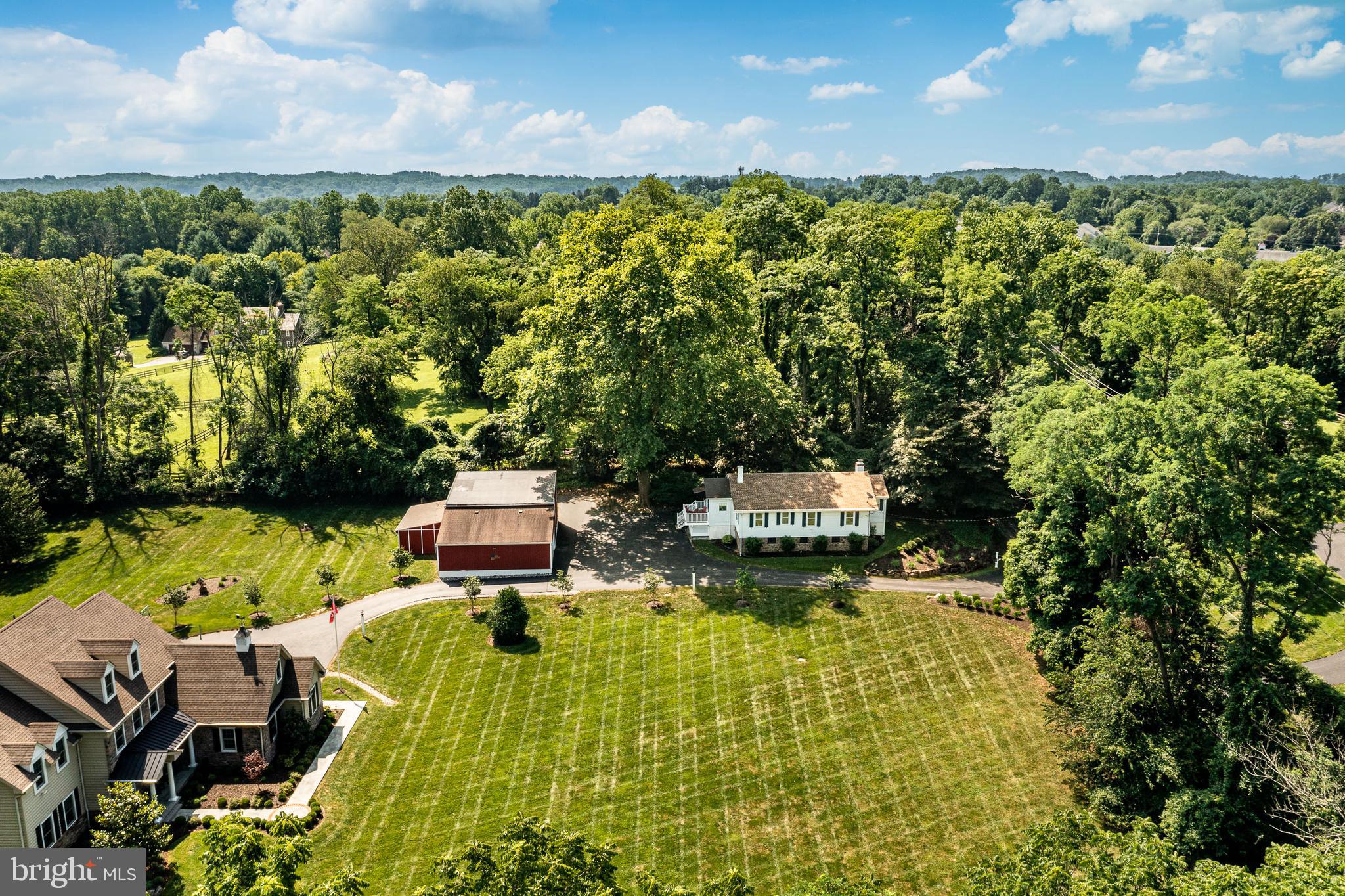 211 Dutton Mill Road West Chester, PA 19380 - Photo 67 of 71 an aerial view of a house with swimming pool