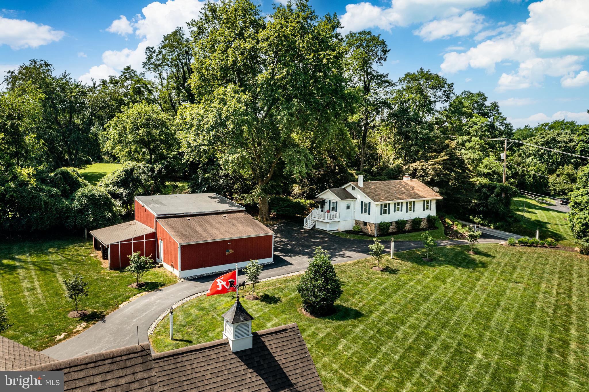 211 Dutton Mill Road West Chester, PA 19380 - Photo 68 of 71 an aerial view of a house with swimming pool and big yard