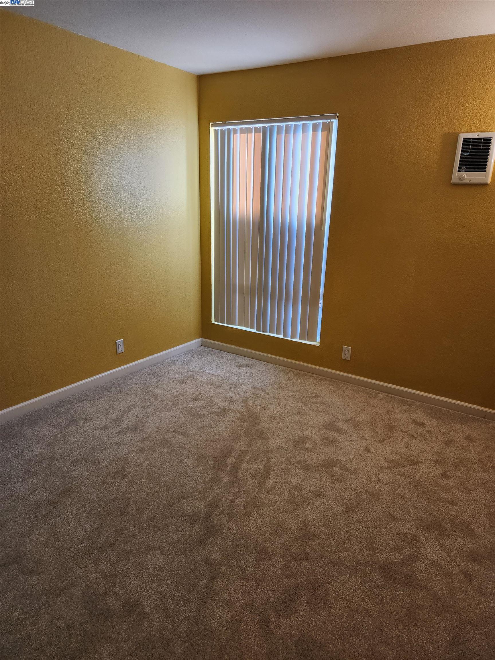 484 Dempsey Road, Unit 186 Milpitas, CA 95035 - Photo 15 of 25 an empty room with windows and entrance