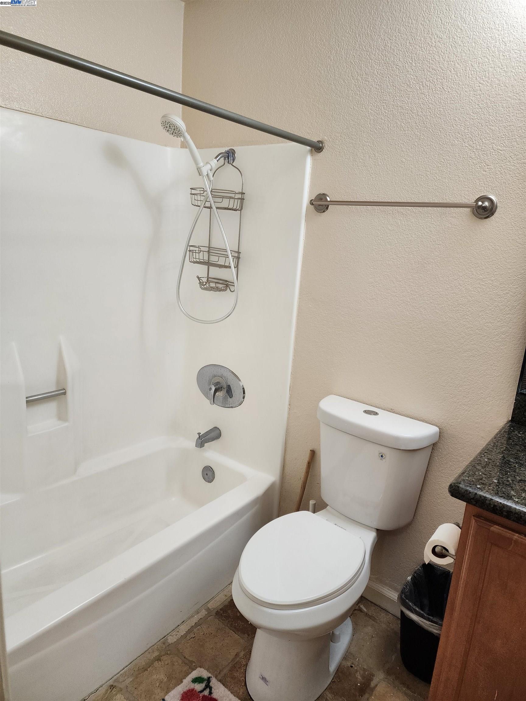 484 Dempsey Road, Unit 186 Milpitas, CA 95035 - Photo 19 of 25 a bathroom with a toilet and a bath tub