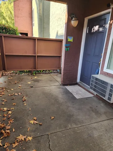 a view of a house with a street