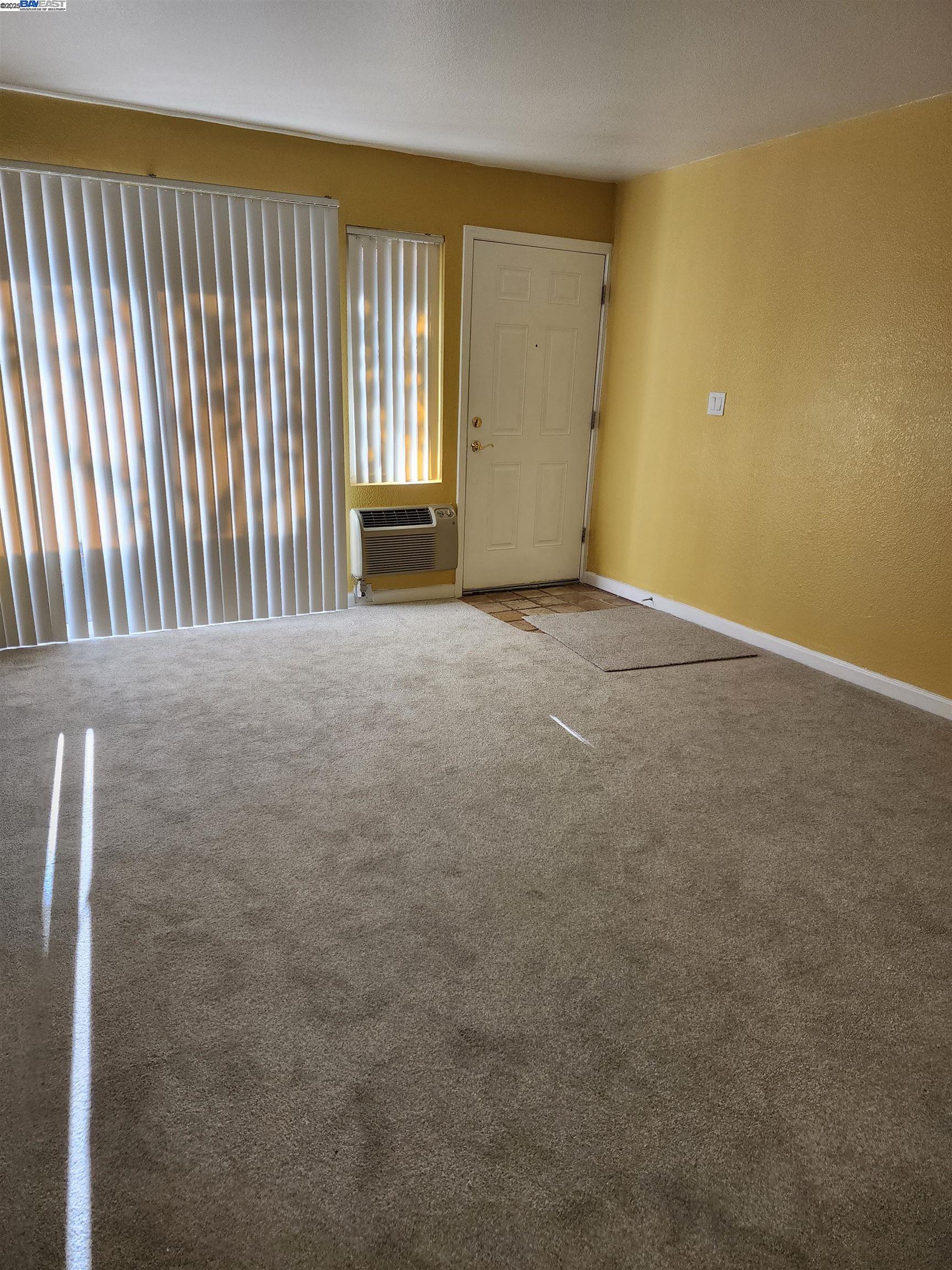 484 Dempsey Road, Unit 186 Milpitas, CA 95035 - Photo 5 of 25 a view of an empty room with a window