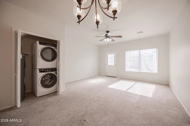 a view of an entryway with a washer and dryer