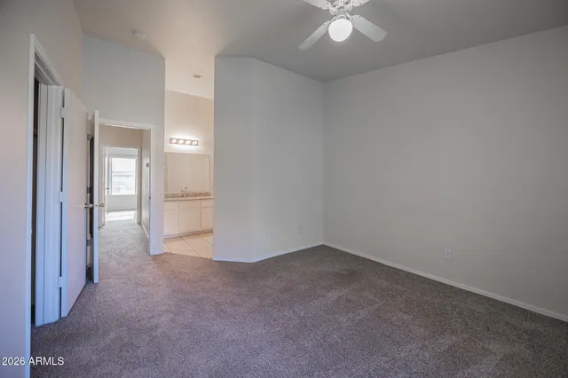 an empty room with a bathroom