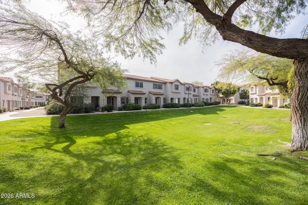 a view of a house with a big yard
