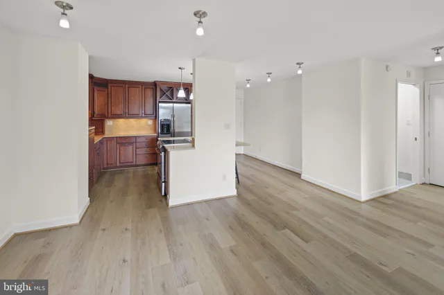 a view of kitchen with wooden floor