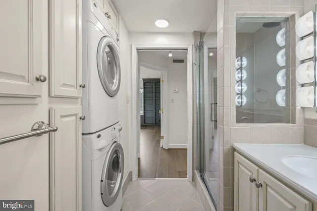 a utility room with dryer and washer