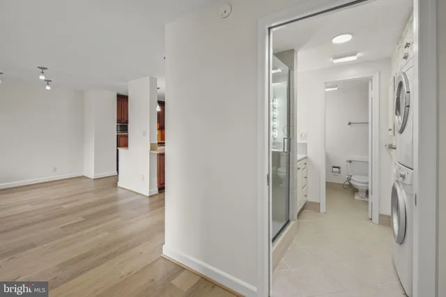 a view of a bathroom with a shower and a toilet