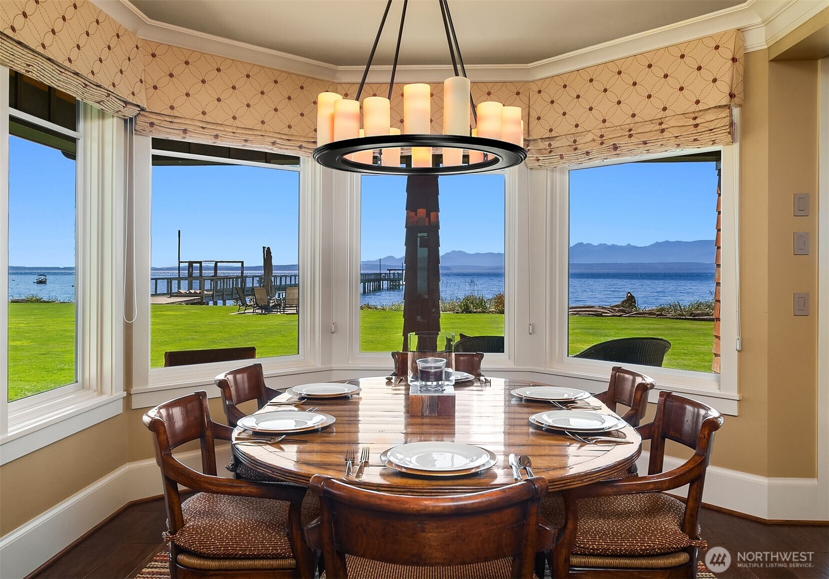 5844 Mutiny Bay Road Freeland, WA 98249 - Photo 18 of 40 a view of a dining room with furniture window and outside view