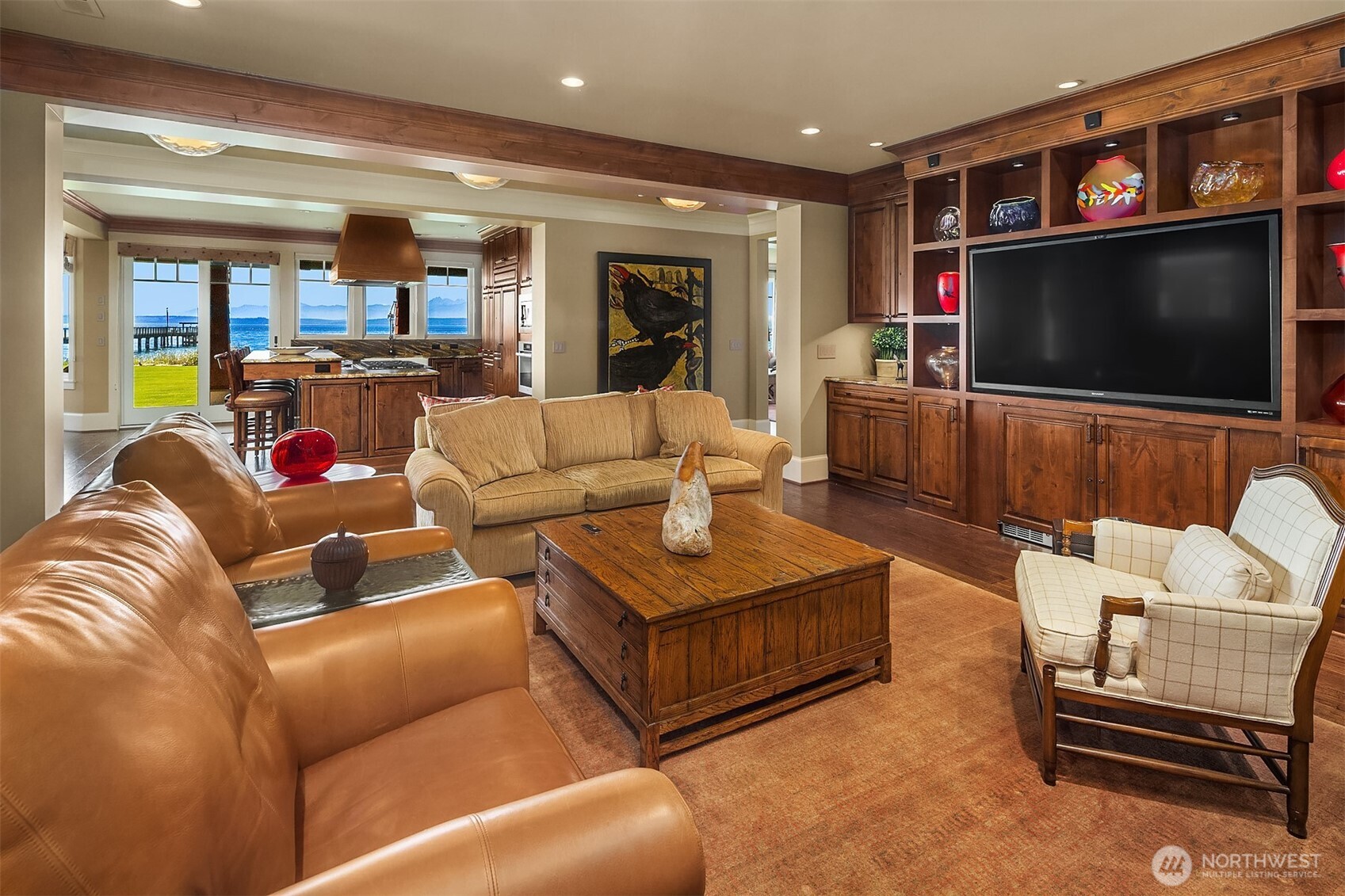 5844 Mutiny Bay Road Freeland, WA 98249 - Photo 19 of 40 a living room with furniture and a flat screen tv