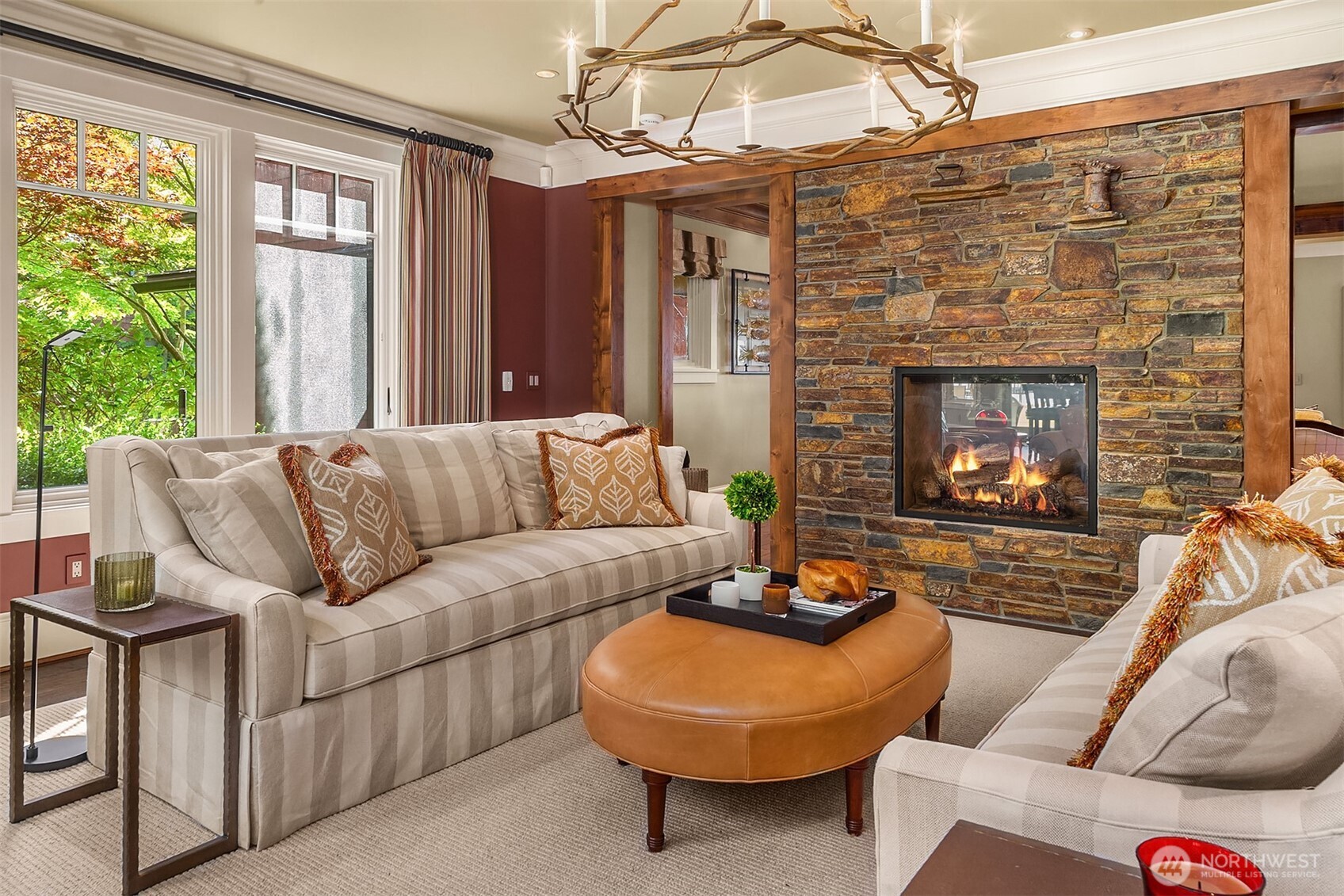 5844 Mutiny Bay Road Freeland, WA 98249 - Photo 22 of 40 a living room with furniture and a fireplace