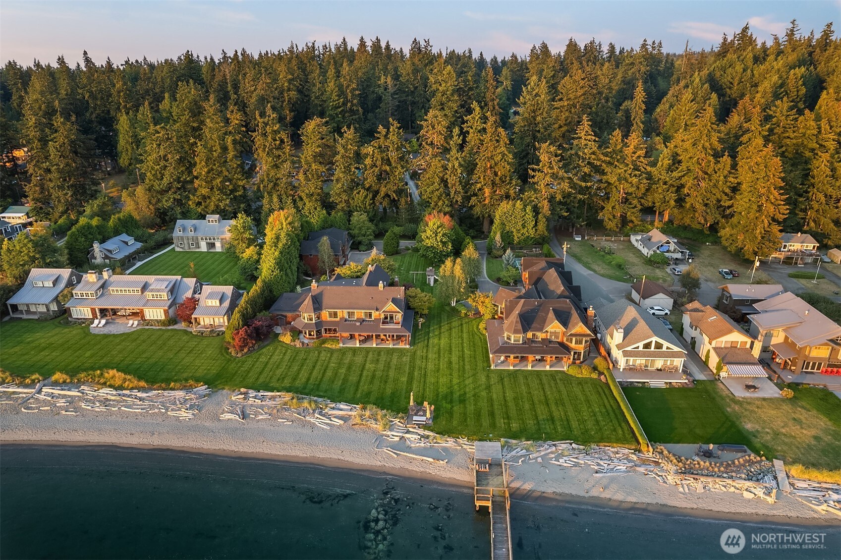 5844 Mutiny Bay Road Freeland, WA 98249 - Photo 4 of 40 an aerial view of a house with a garden and trees