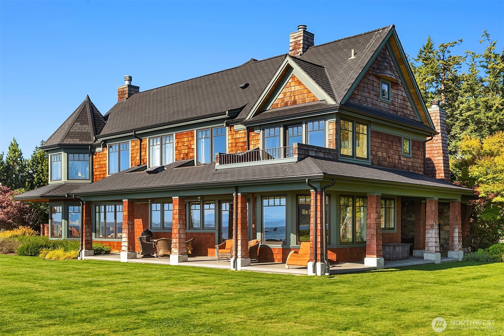 5844 Mutiny Bay Road Freeland, WA 98249 - Photo 5 of 40 front view of a brick house with a yard