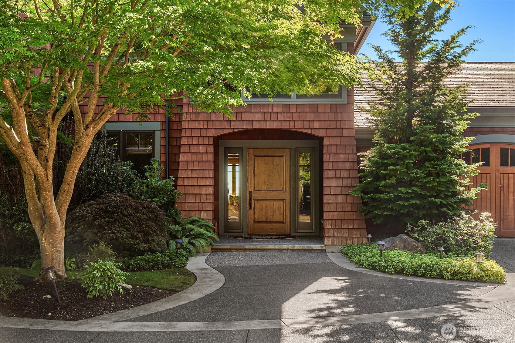 5844 Mutiny Bay Road Freeland, WA 98249 - Photo 7 of 40 a front view of a house with garden