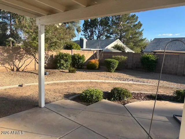 a view of a bench in the patio
