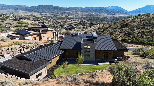 1918 Chimney Rock Road Heber City, UT 84032 - Photo 8 of 74 Modern architectural design with a dark metal roof and stone veneer accents