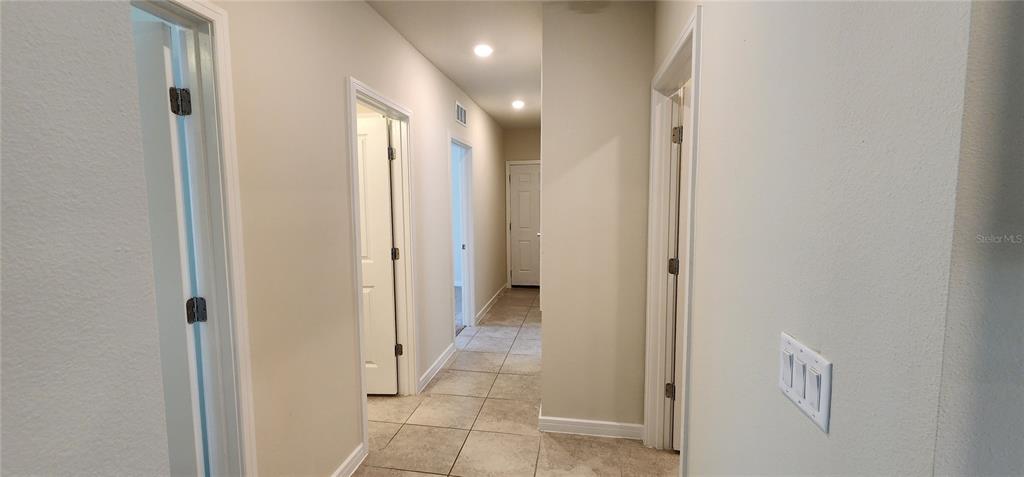3538 Treetop Street DeLand, FL 32724 - Photo 5 of 7 a view of a hallway