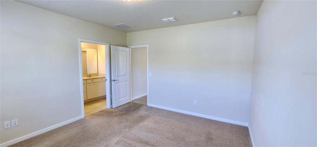 3538 Treetop Street DeLand, FL 32724 - Photo 7 of 7 a view of an empty room and a window
