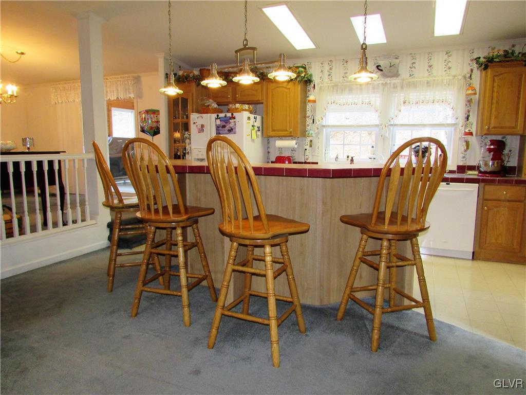 648 Old Mill Road Lehighton, PA 18235 - Photo 17 of 48 a view of a dining room with furniture and chandelier
