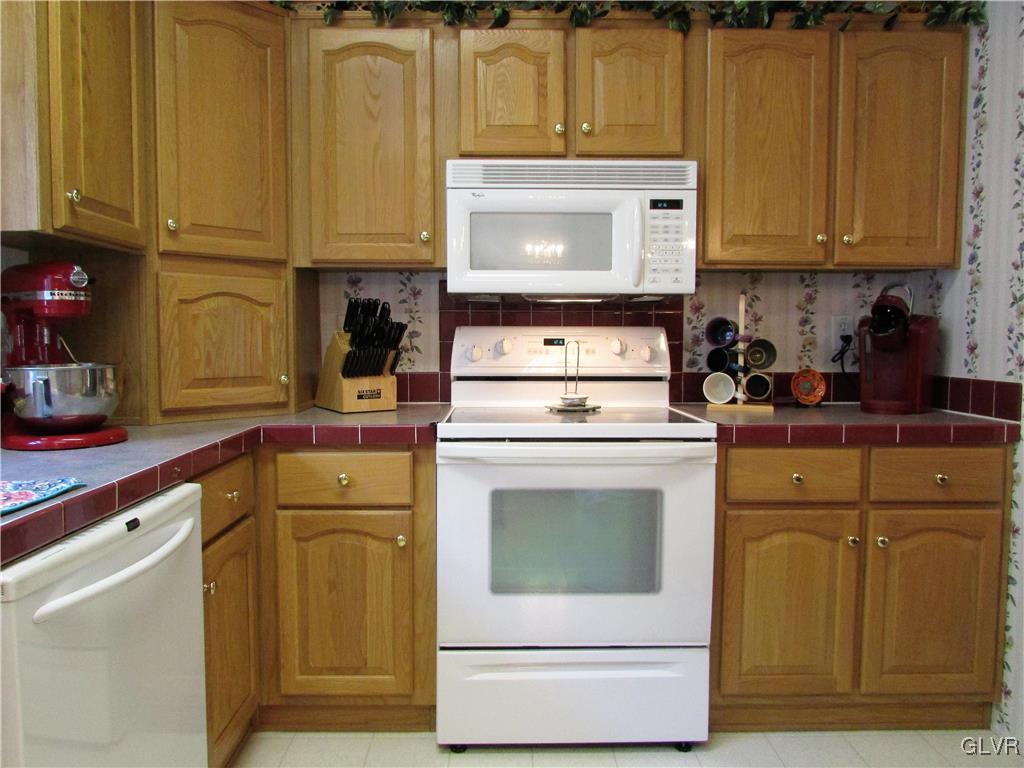648 Old Mill Road Lehighton, PA 18235 - Photo 20 of 48 a kitchen with cabinets appliances and a counter top