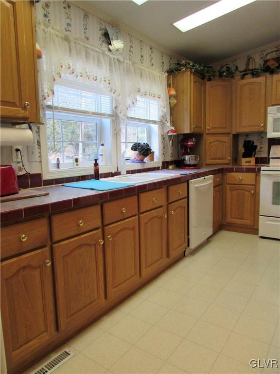 648 Old Mill Road Lehighton, PA 18235 - Photo 23 of 48 a kitchen with cabinets and a sink