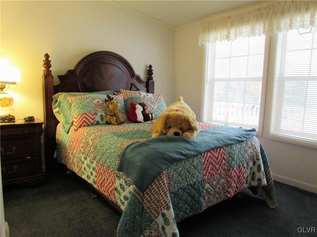 648 Old Mill Road Lehighton, PA 18235 - Photo 30 of 48 a bedroom with a bed and a window