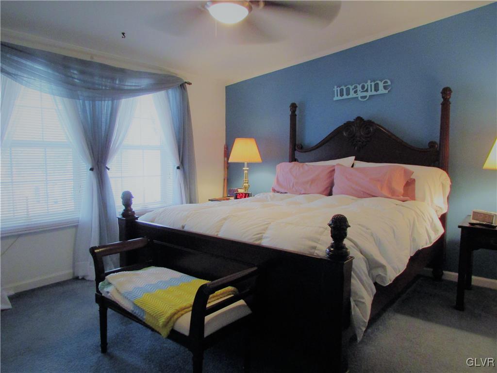 648 Old Mill Road Lehighton, PA 18235 - Photo 34 of 48 a bedroom with a bed table and window