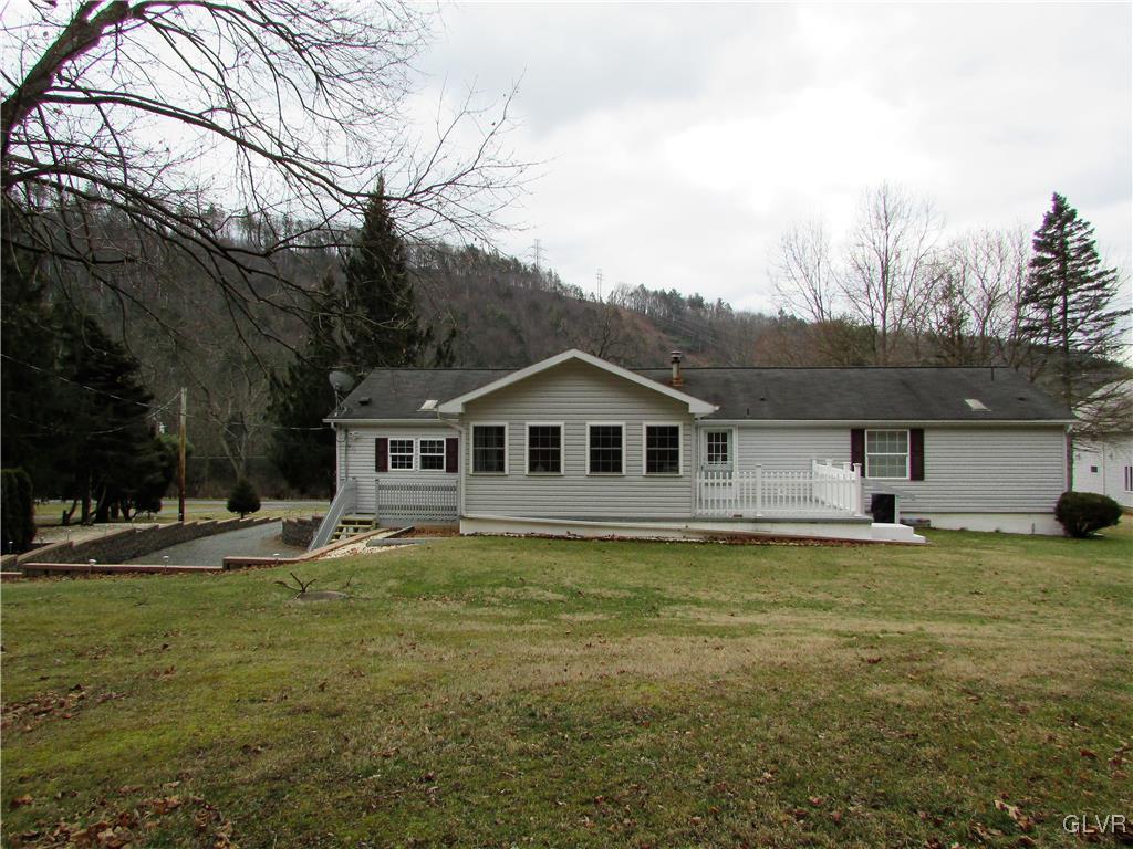 648 Old Mill Road Lehighton, PA 18235 - Photo 44 of 48 a house that has a big yard and a large trees