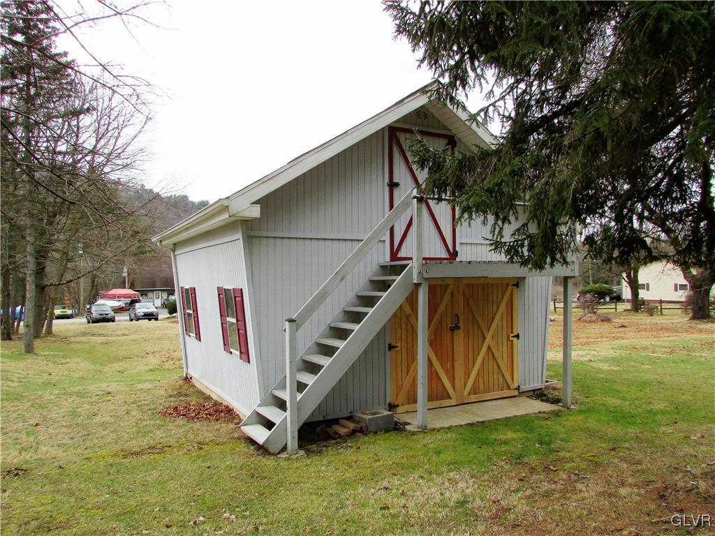 648 Old Mill Road Lehighton, PA 18235 - Photo 46 of 48 a view of a small house with backyard