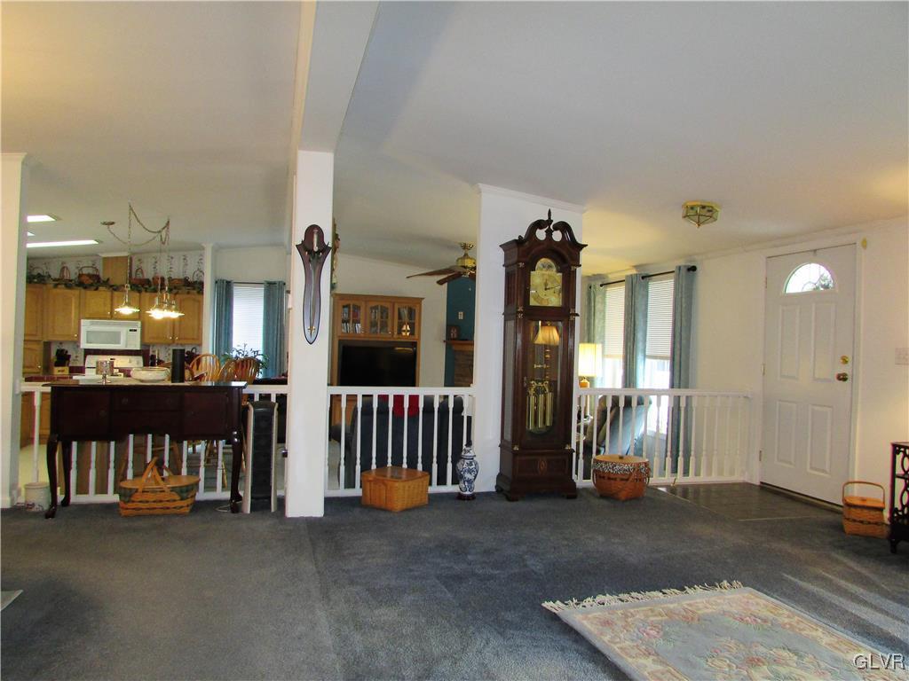 648 Old Mill Road Lehighton, PA 18235 - Photo 10 of 48 a view of a livingroom with furniture and staircase