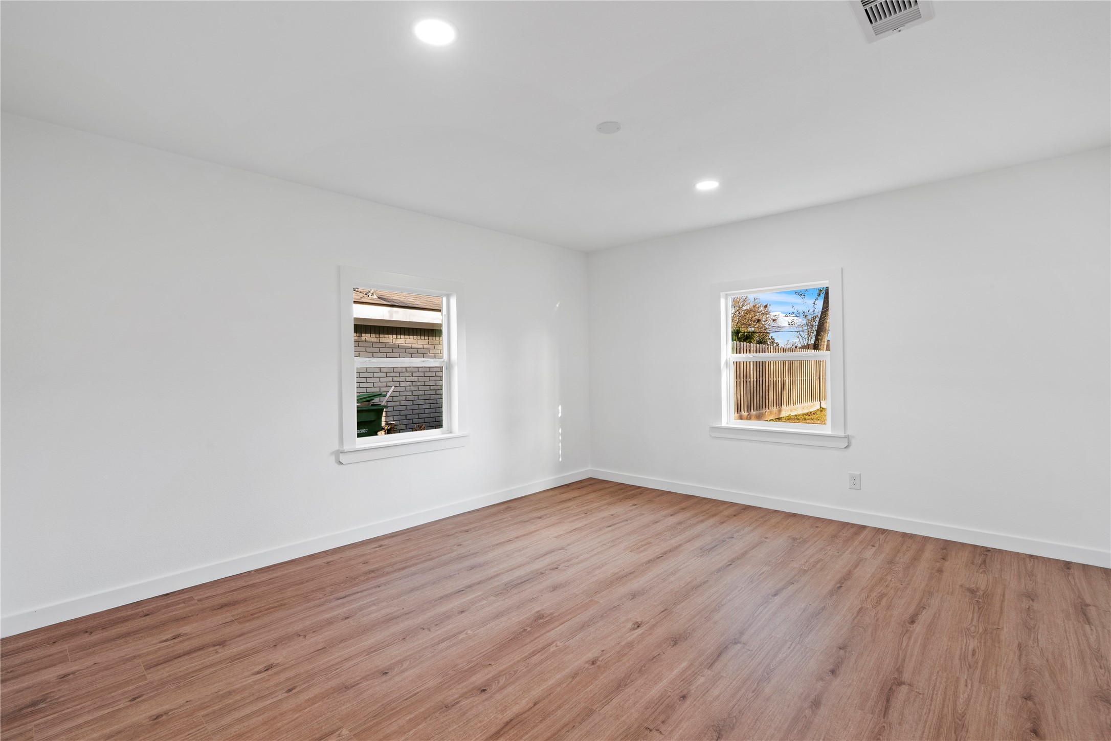 5023 Redstart Street Houston, TX 77035 - Photo 27 of 34 This light-filled room provides a flexible space for family or a home office, complete with fresh paint and wide-plank flooring throughout.