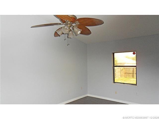 699 Southwest Hoffenberg Avenue Port St. Lucie, FL 34953 - Photo 26 of 26 Master Bedroom. Split floor plan