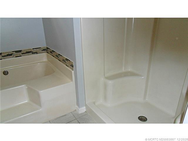 699 Southwest Hoffenberg Avenue Port St. Lucie, FL 34953 - Photo 13 of 26 Master Bath/Spa. Separate shower and tub