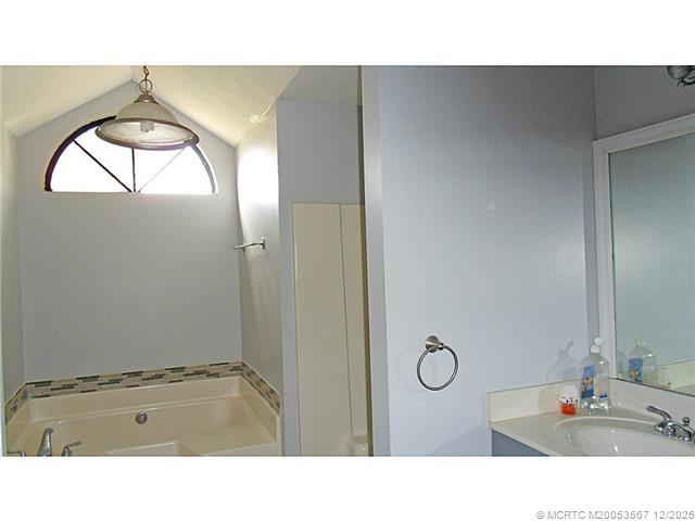 699 Southwest Hoffenberg Avenue Port St. Lucie, FL 34953 - Photo 15 of 26 Master Bath/Spa. High ceiling to give you natural light and still give you privacy