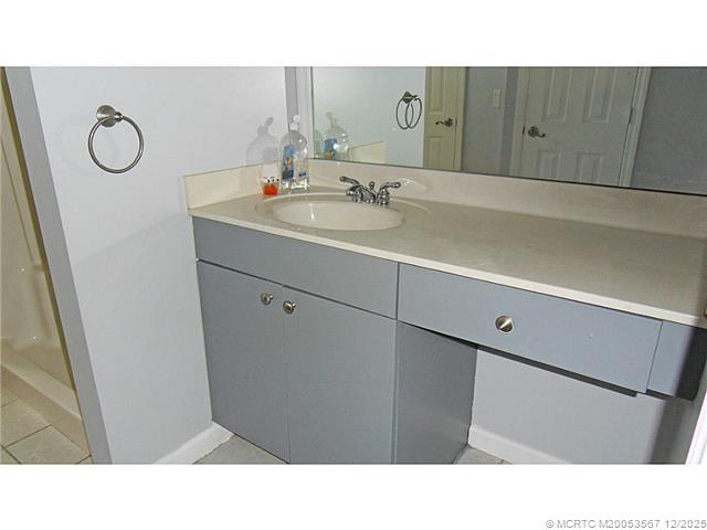 699 Southwest Hoffenberg Avenue Port St. Lucie, FL 34953 - Photo 16 of 26 Master Bath/Spa. Master vanity with make-up counter