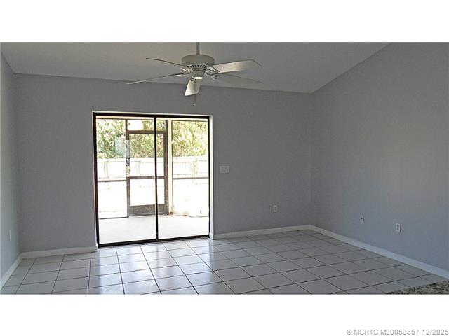 699 Southwest Hoffenberg Avenue Port St. Lucie, FL 34953 - Photo 4 of 26 Den/Family/Great Room. Family room opens onto a screened patio