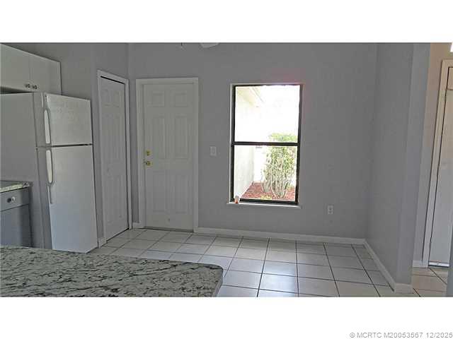 699 Southwest Hoffenberg Avenue Port St. Lucie, FL 34953 - Photo 9 of 26 Kitchen. Eat in kitchen