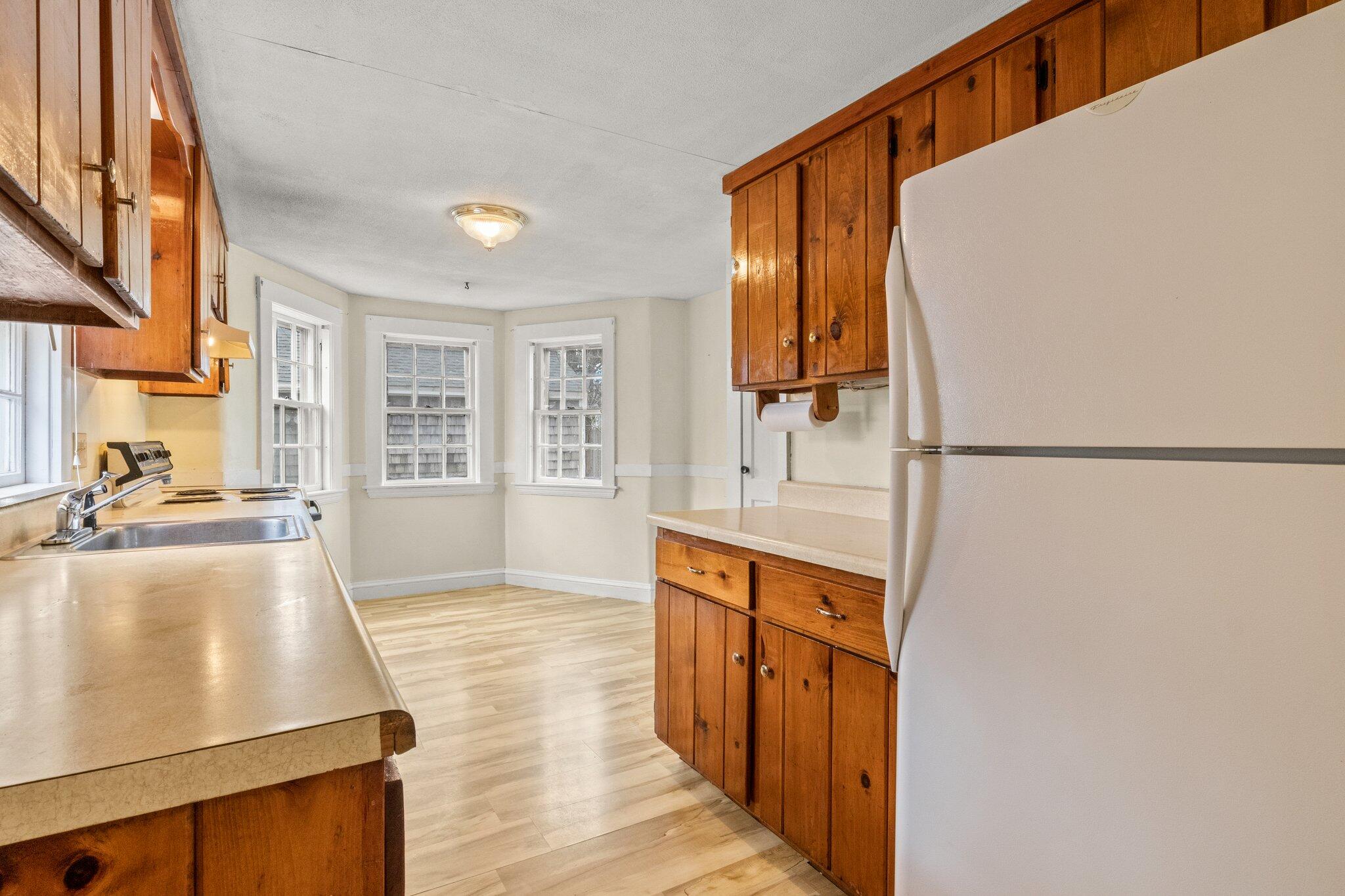 16 Oak Street Hyannis, MA 02601 - Photo 13 of 38 a hallway with a large window