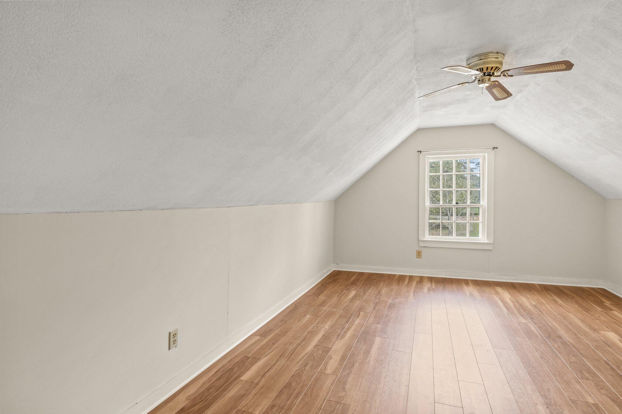 16 Oak Street Hyannis, MA 02601 - Photo 22 of 38 a view of a room with a wooden floor and white walls