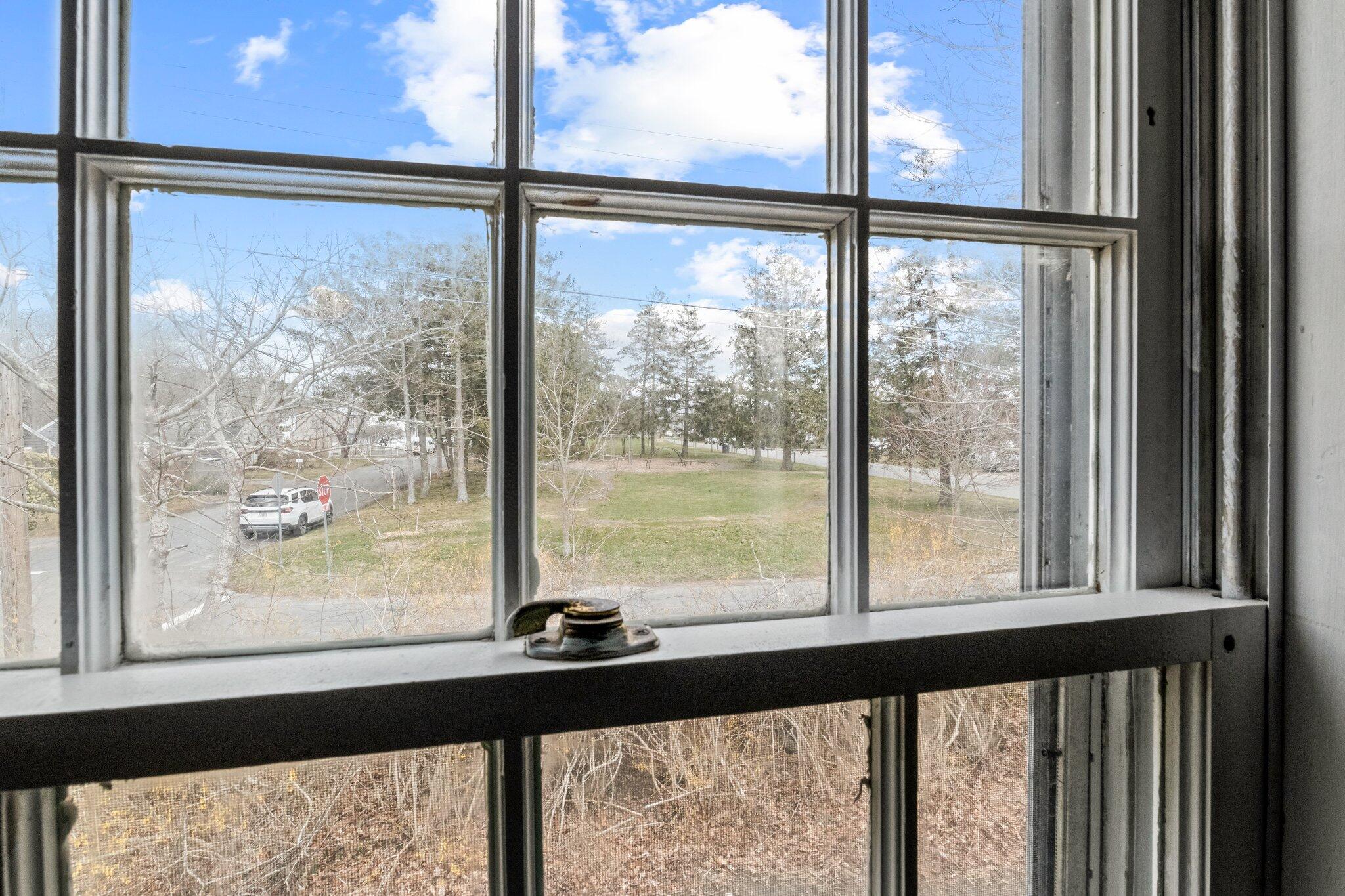 16 Oak Street Hyannis, MA 02601 - Photo 25 of 38 a view of a room with large windows