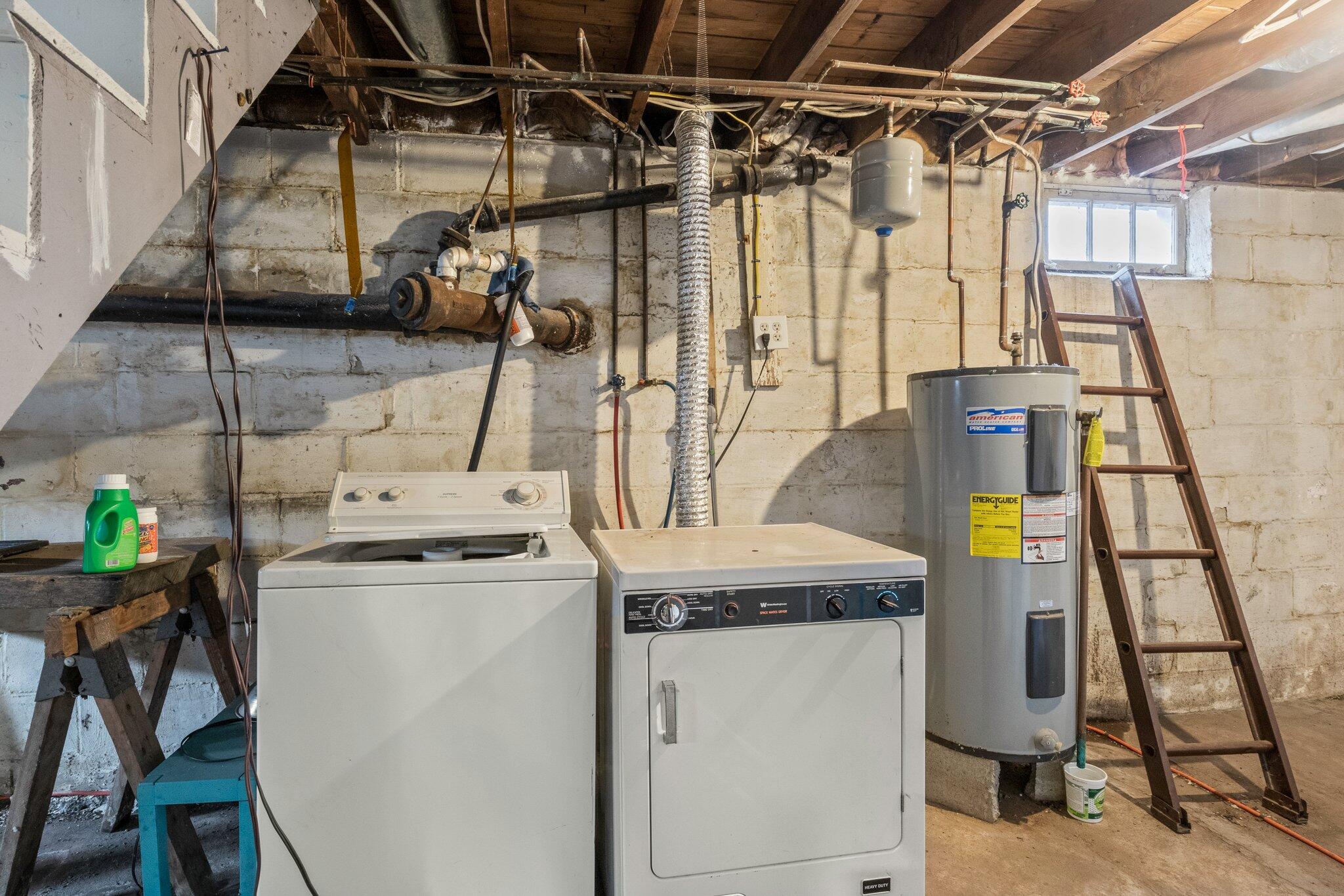 16 Oak Street Hyannis, MA 02601 - Photo 28 of 38 a utility room with dryer and washer