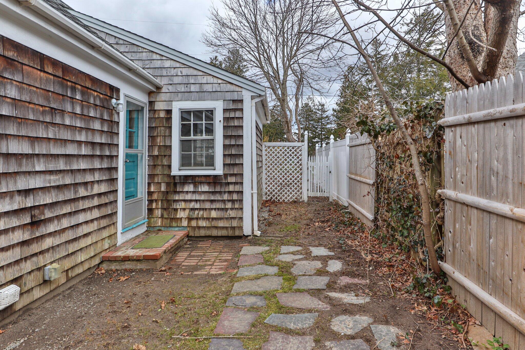 16 Oak Street Hyannis, MA 02601 - Photo 30 of 38 a backyard of a house