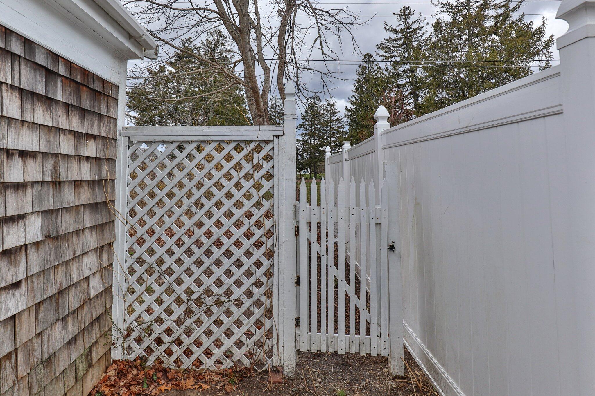 16 Oak Street Hyannis, MA 02601 - Photo 31 of 38 a view of a black gate