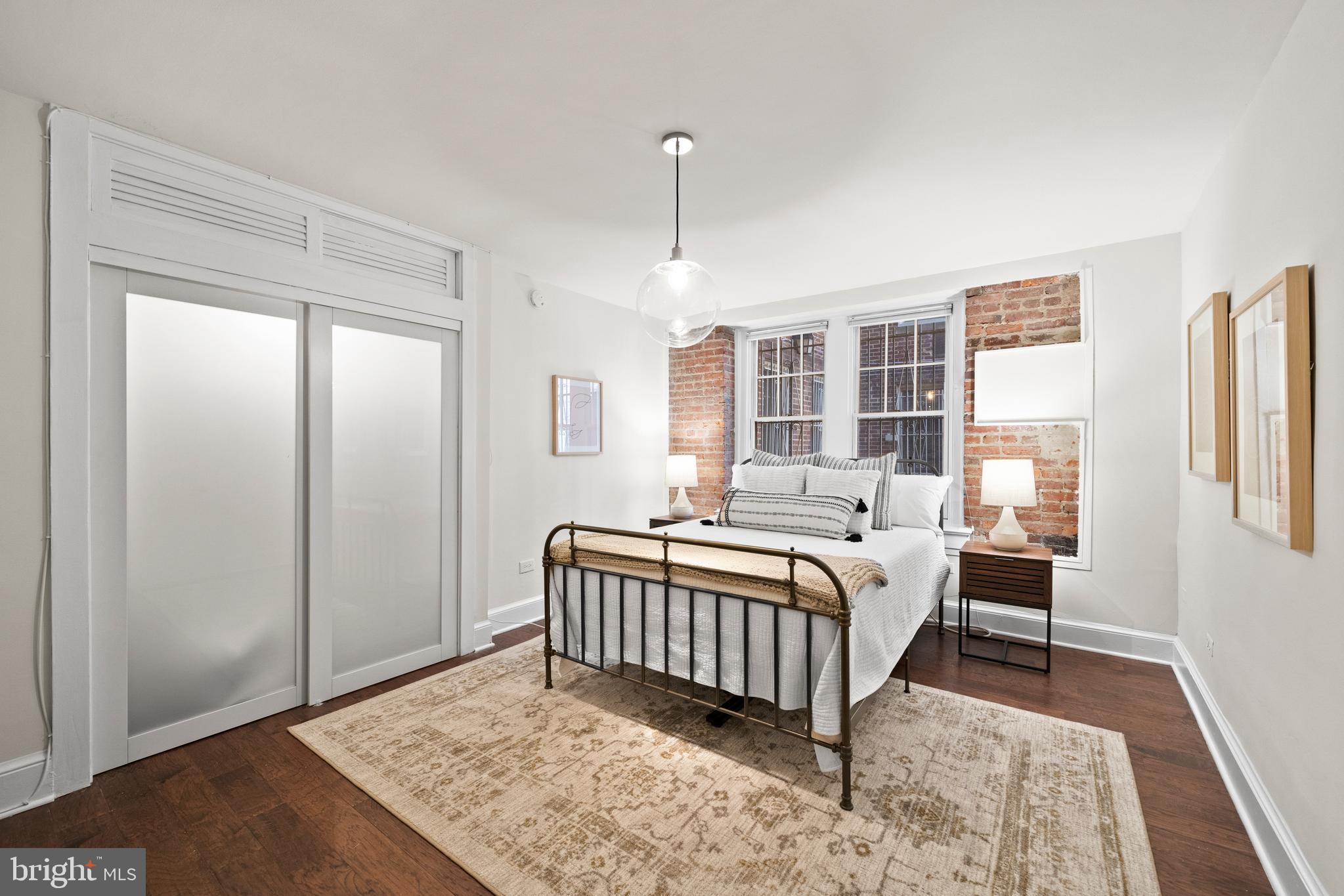 2410 20th Street Northwest, Unit 9 Washington, DC 20009 - Photo 10 of 20 Primary Bedroom with Exposed Brick
